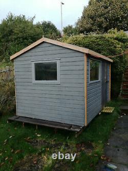 12 x 8 Shed Garden Room. New Roof. Newly Paint. New hardwood windows. Insulated