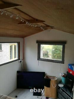 12 x 8 Shed Garden Room. New Roof. Newly Paint. New hardwood windows. Insulated