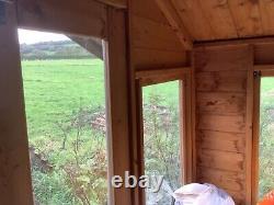 8' x 6' solid wood Garden Shed, summerhouse- Great condition, with 2 feet veran