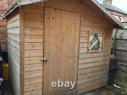 Excellent condition wooden garden shed/Wendy house