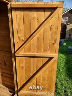 Garden Shed. Tanalised Deluxe loglap Pent Shed 10 x 8