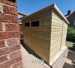 Heavy duty loglap wooden sheds pressure treated summerhouse or garden rooms