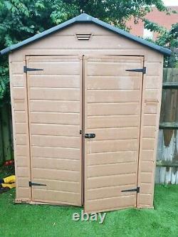 Used Plastic Brown 5.9ft x 4.10ft Garden Shed with Window