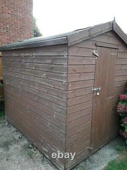 Wooden garden shed 8ft x 6ft heavy duty with apex roof (needs covering again)