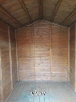 Wooden garden shed 8ft x 6ft heavy duty with apex roof (needs covering again)