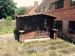 Wooden garden shed / summer house
